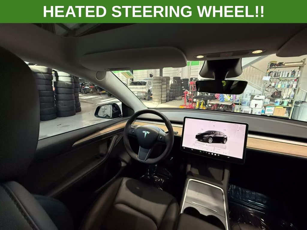 2023 Solid Black Tesla Model Y Long Range AWD SUV