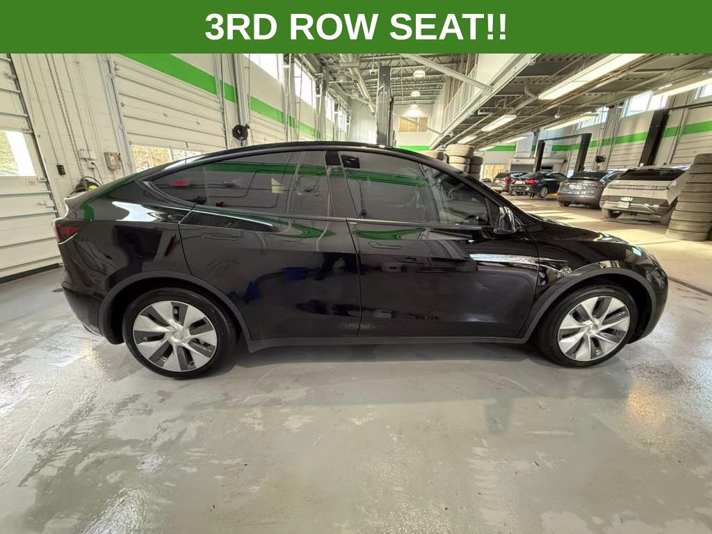 2023 Solid Black Tesla Model Y Long Range AWD SUV