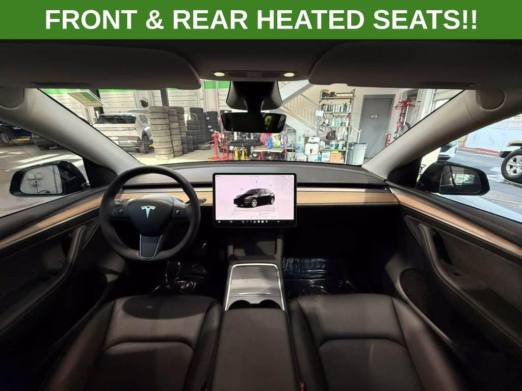 2023 Solid Black Tesla Model Y Long Range AWD SUV