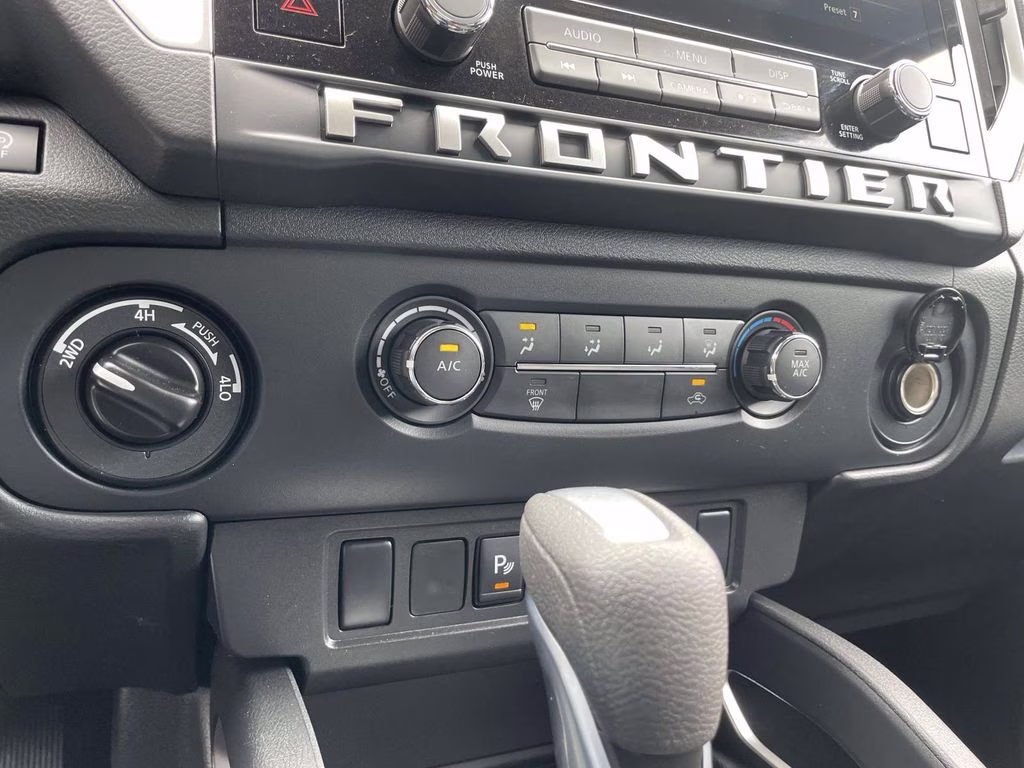 2026 Glacier White Nissan Frontier SV 4X4 Truck