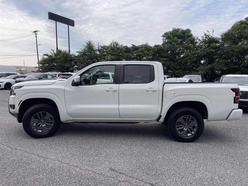 2026 Glacier White Nissan Frontier SV 4X4 Truck
