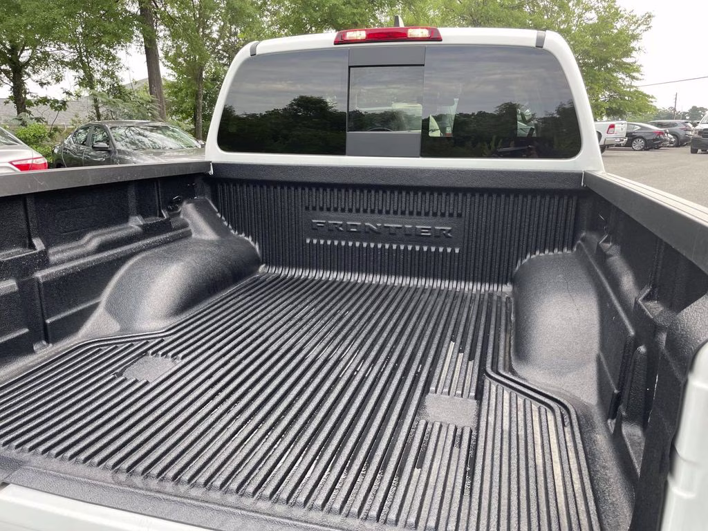 2026 Glacier White Nissan Frontier SV 4X4 Truck