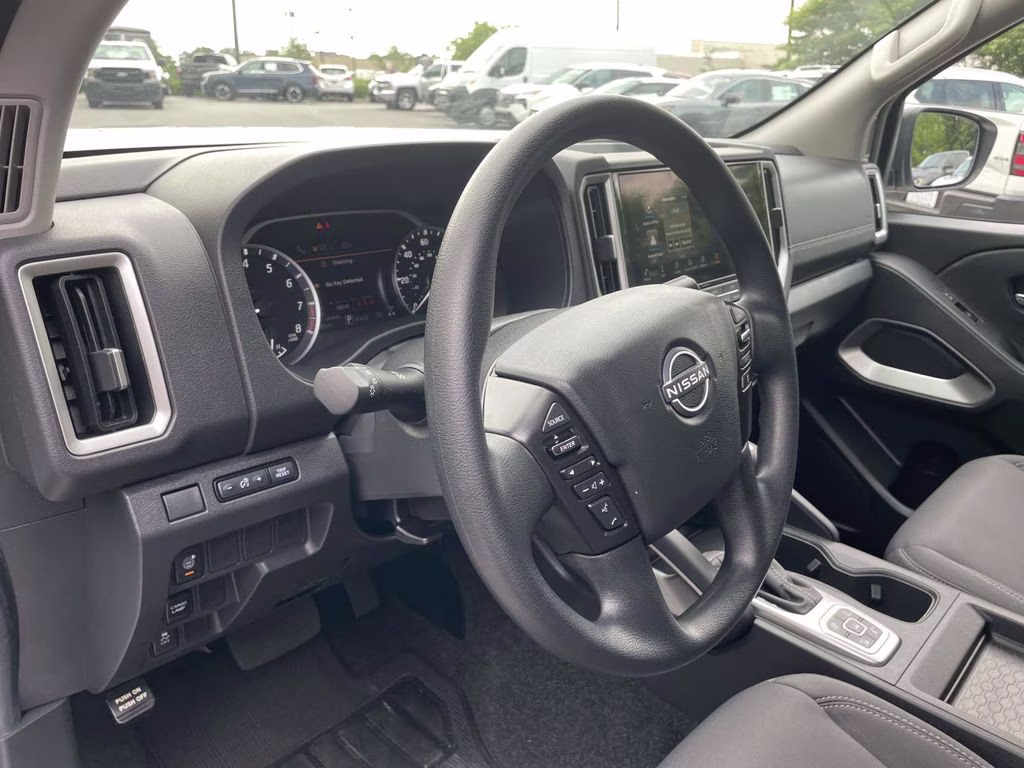 2026 Glacier White Nissan Frontier SV 4X4 Truck