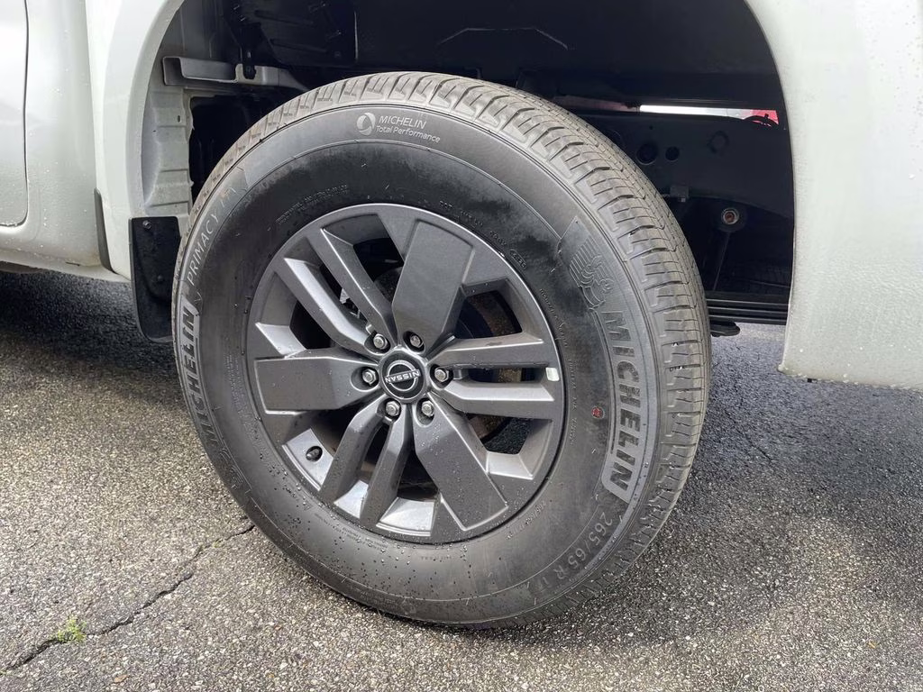 2026 Glacier White Nissan Frontier SV 4X4 Truck