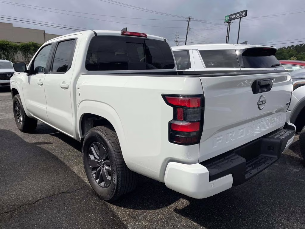 2026 Glacier White Nissan Frontier SV 4X4 Truck