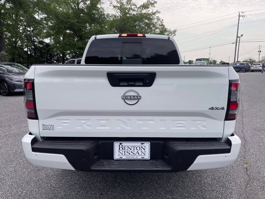 2026 Glacier White Nissan Frontier SV 4X4 Truck