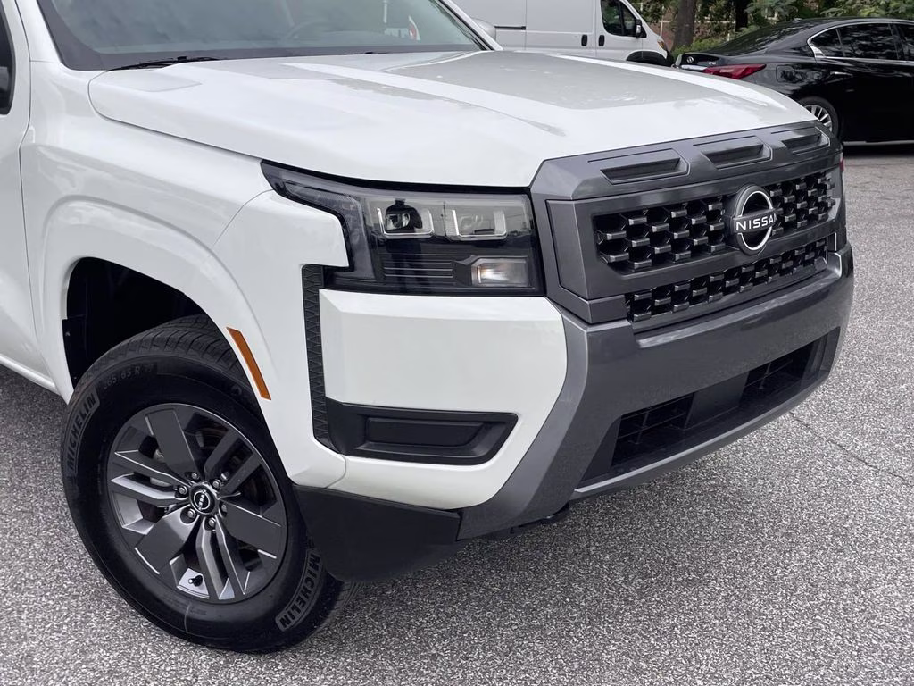 2026 Glacier White Nissan Frontier SV 4X4 Truck