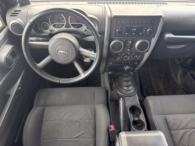 2010 Black Jeep Wrangler Unlimited Mountain 4X4 Convertible