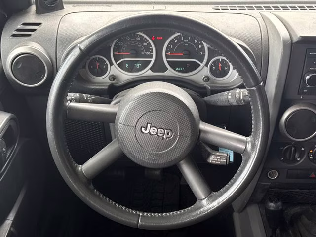 2010 Black Jeep Wrangler Unlimited Mountain 4X4 Convertible
