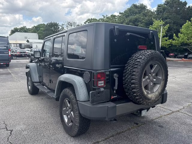2010 Black Jeep Wrangler Unlimited Mountain 4X4 Convertible