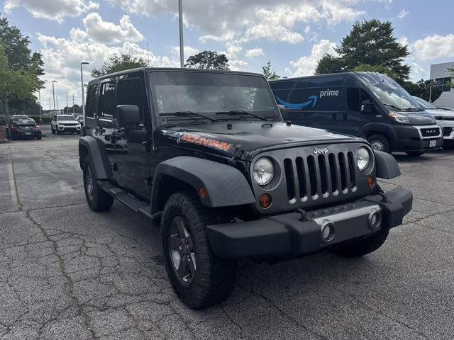 2010 Black Jeep Wrangler Unlimited Mountain 4X4 Convertible