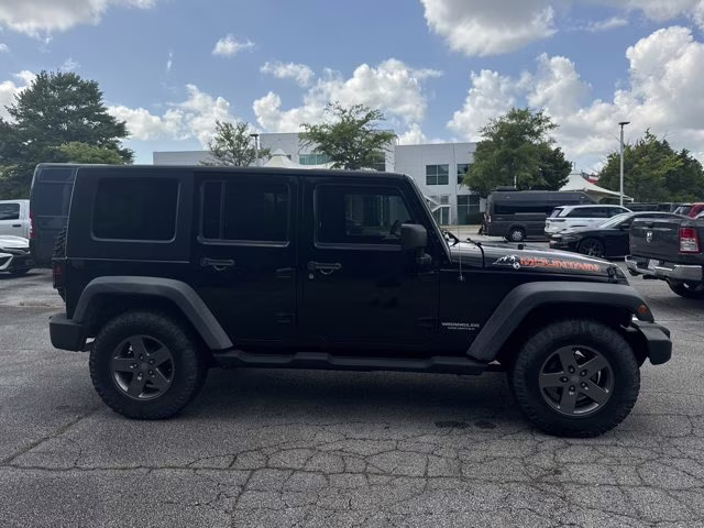 2010 Black Jeep Wrangler Unlimited Mountain 4X4 Convertible