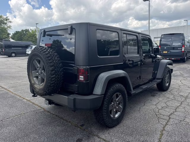 2010 Black Jeep Wrangler Unlimited Mountain 4X4 Convertible