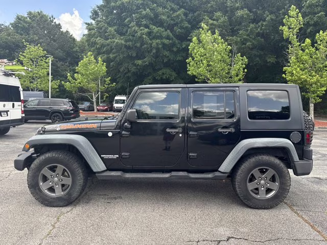 2010 Black Jeep Wrangler Unlimited Mountain 4X4 Convertible