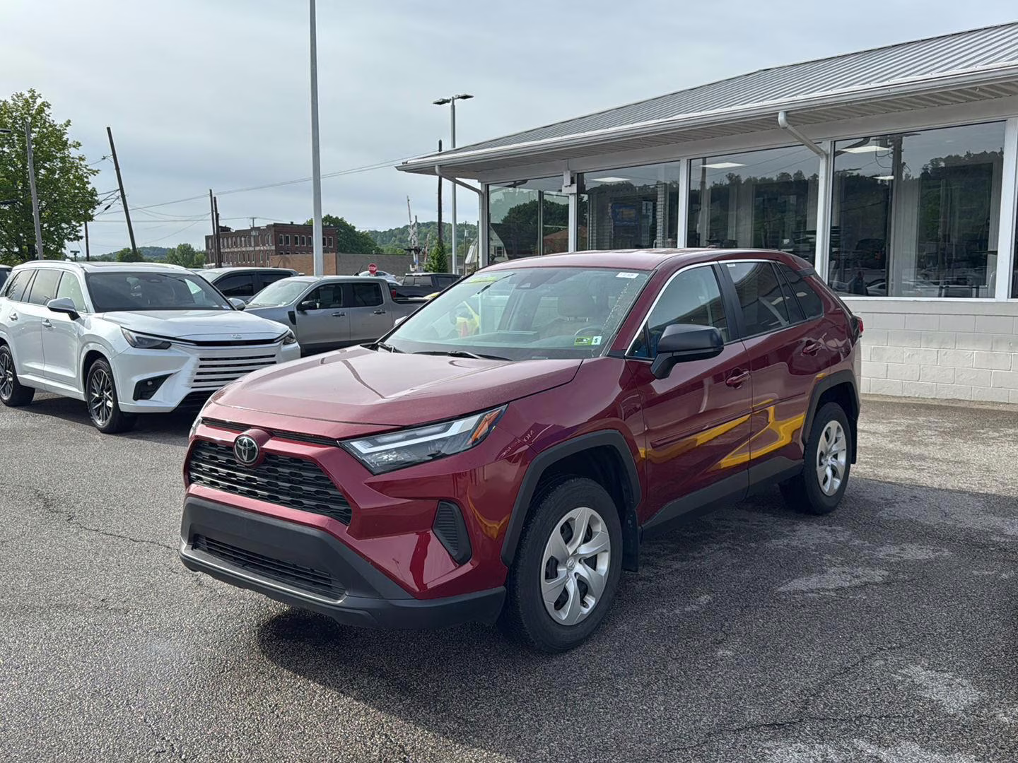2024 Ruby Flare Pearl Toyota RAV4 LE AWD SUV
