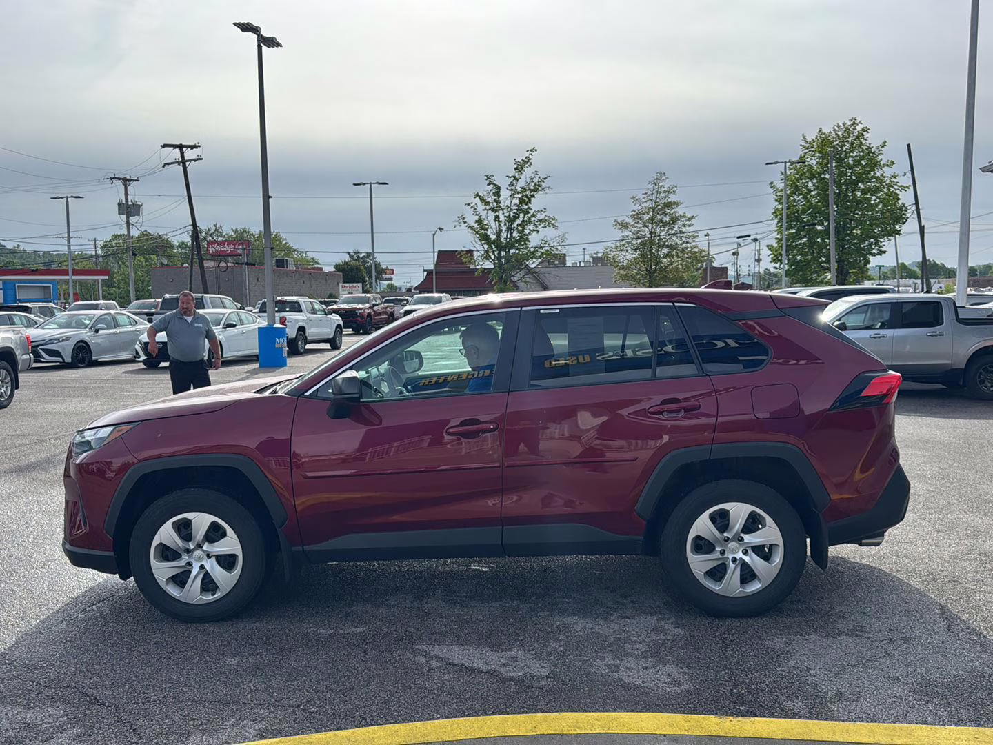 2024 Ruby Flare Pearl Toyota RAV4 LE AWD SUV