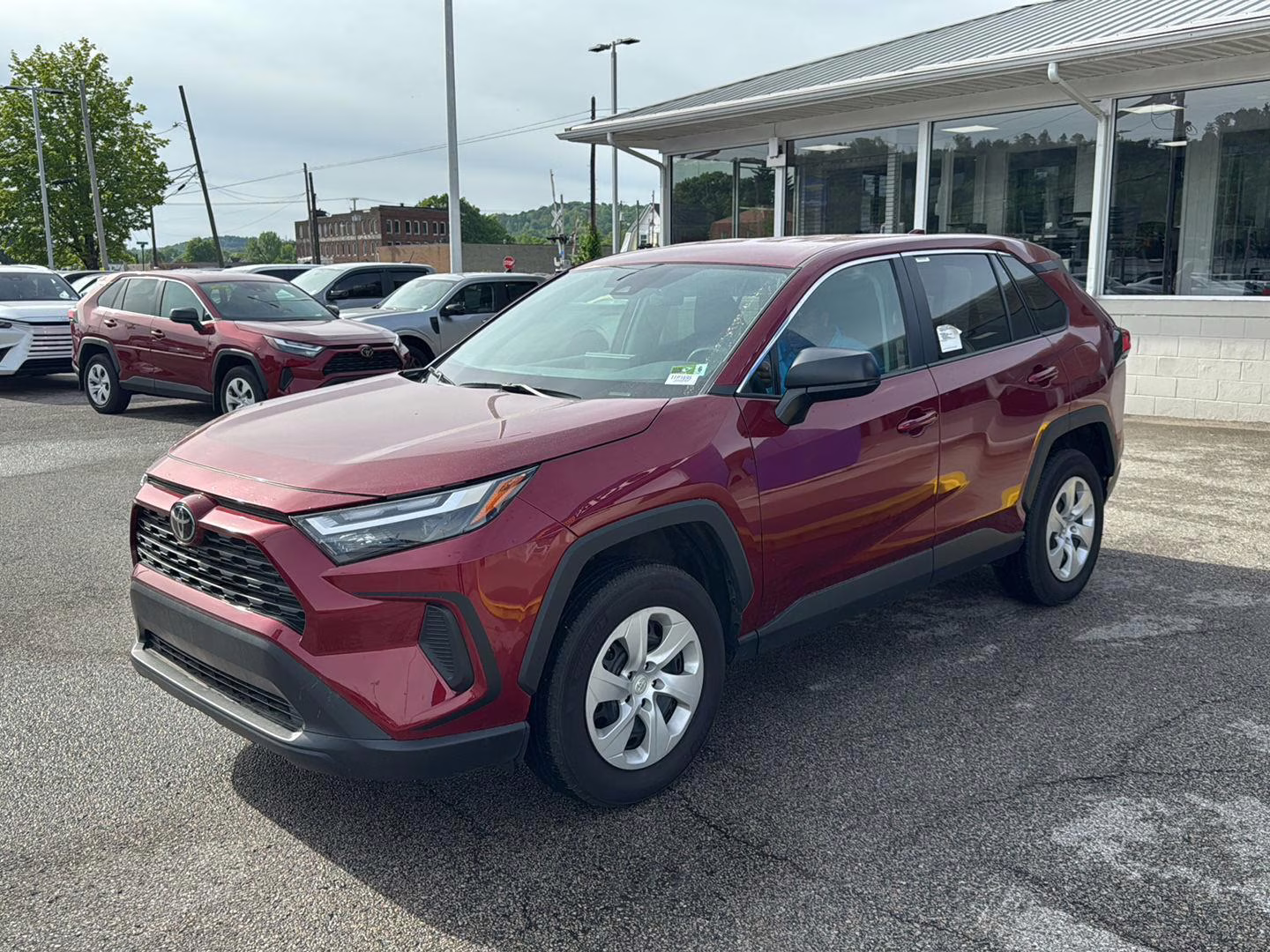 2024 Ruby Flare Pearl Toyota RAV4 LE AWD SUV