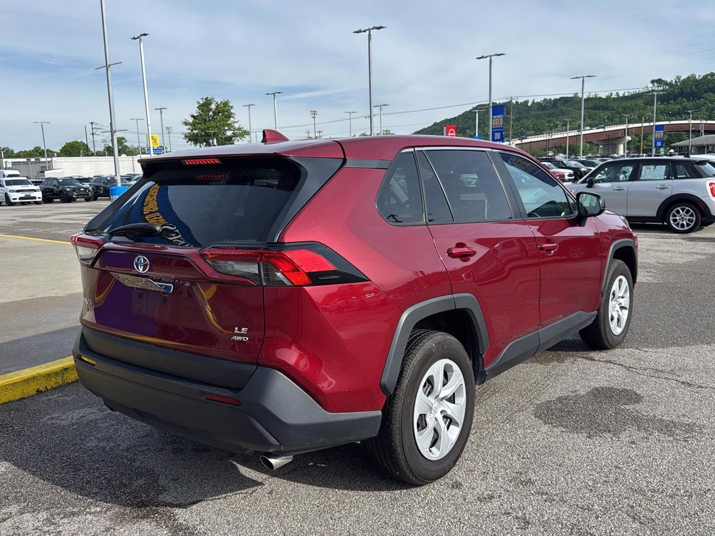 2024 Ruby Flare Pearl Toyota RAV4 LE AWD SUV