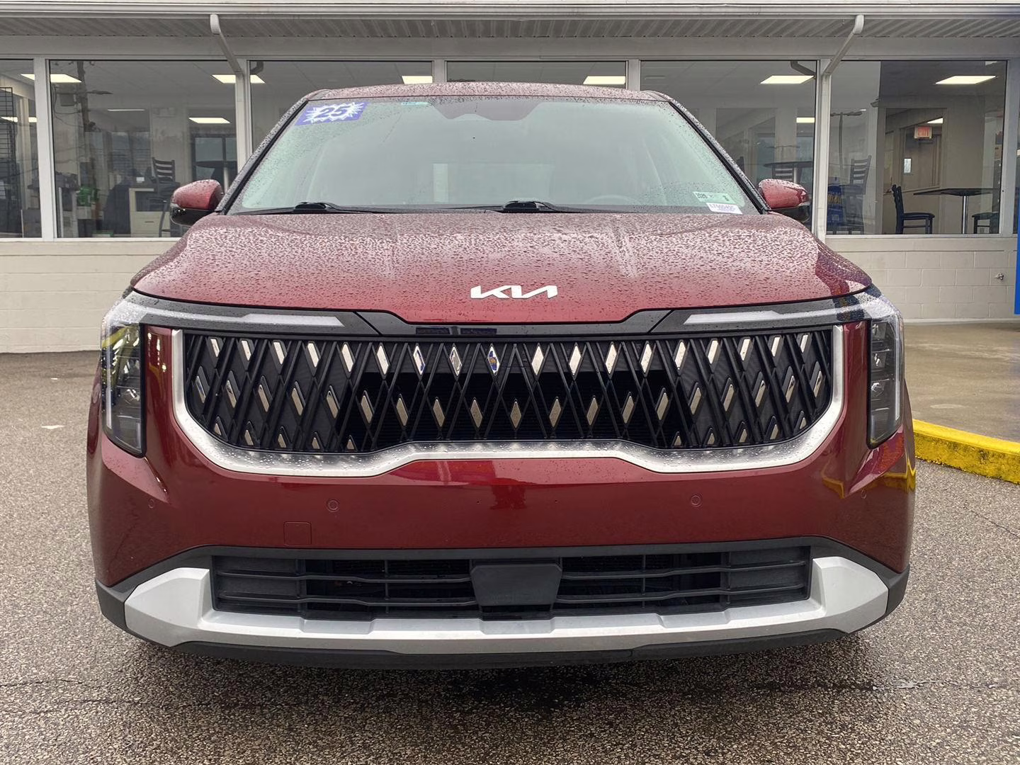 2025 Flare Red Kia Carnival LXS FWD Van