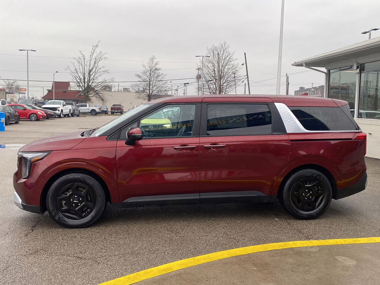 2025 Flare Red Kia Carnival LXS FWD Van