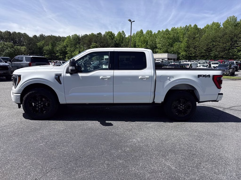 2023 Star White Metallic Tri-Coat Ford F-150 Platinum 4X4 Truck