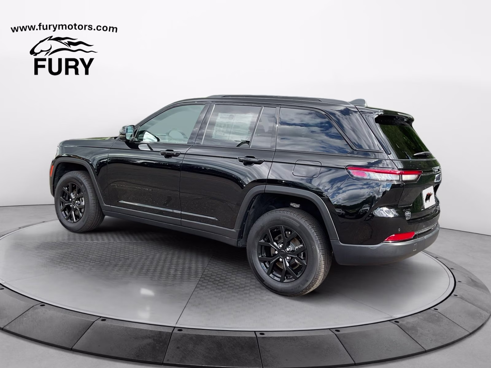 2025 Diamond Black Crystal Pearlcoat Jeep Grand Cherokee Altitude 4X4 SUV