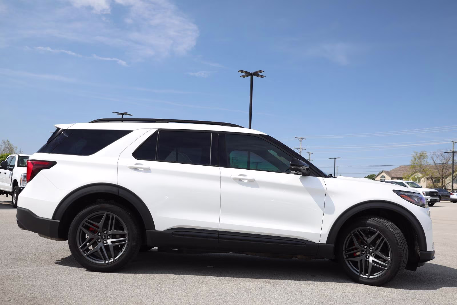 2025 Star White Metallic Tri-Coat Ford Explorer ST 4X4 SUV