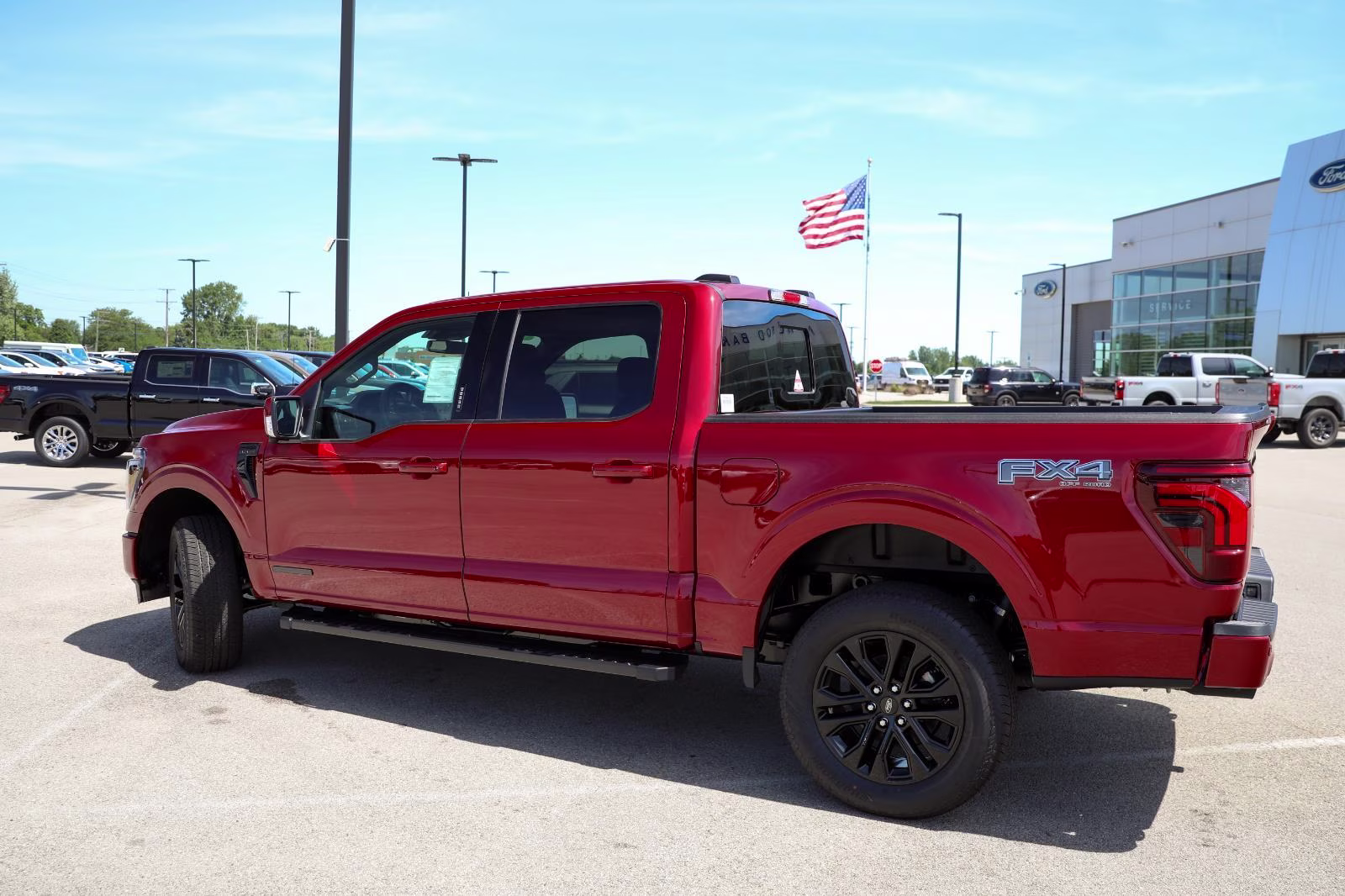 2026 Ruby Red Metallic Tinted Clearcoat Ford F-150 LARIAT 4X4 Truck