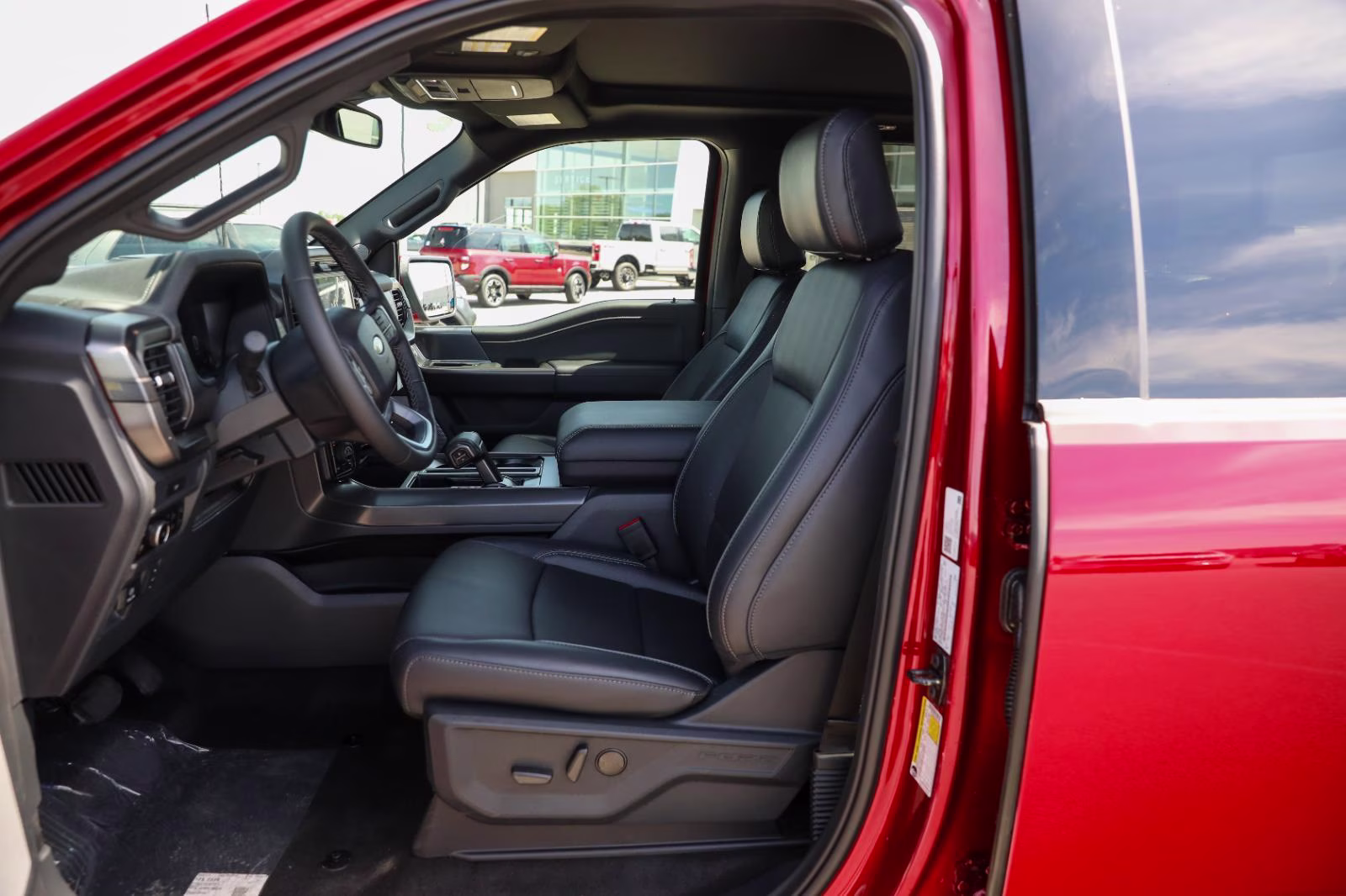 2026 Ruby Red Metallic Tinted Clearcoat Ford F-150 LARIAT 4X4 Truck