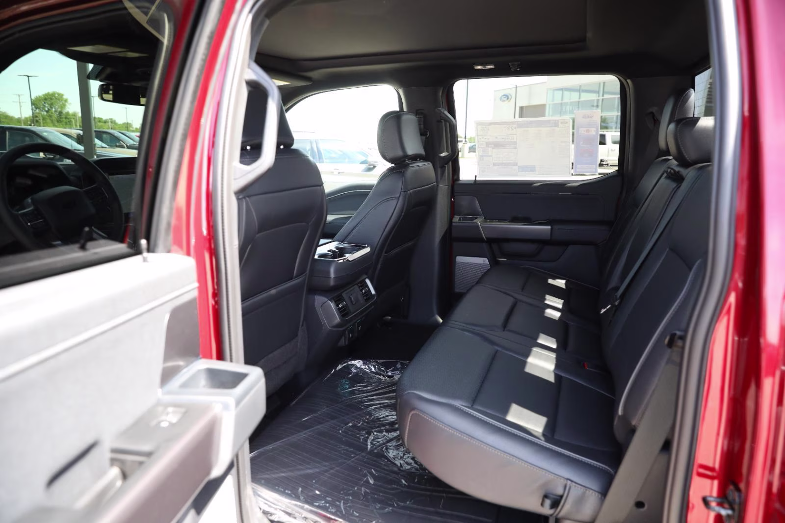 2026 Ruby Red Metallic Tinted Clearcoat Ford F-150 LARIAT 4X4 Truck