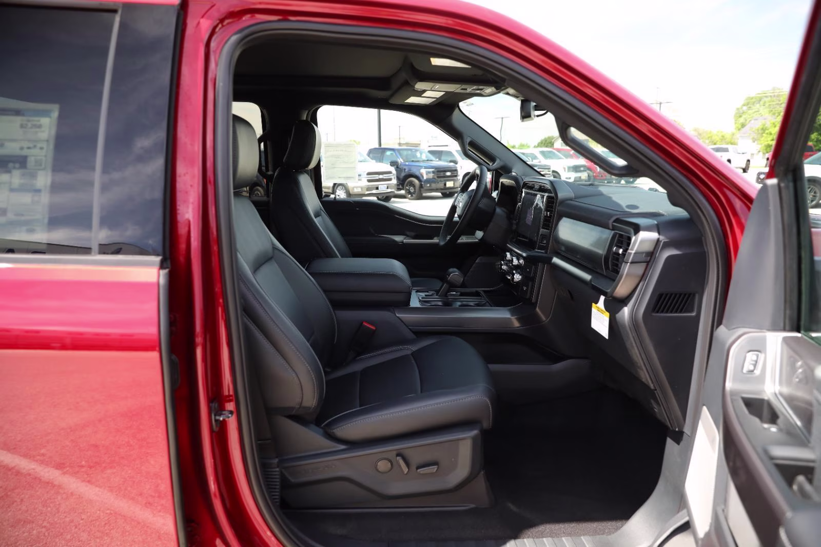 2026 Ruby Red Metallic Tinted Clearcoat Ford F-150 LARIAT 4X4 Truck