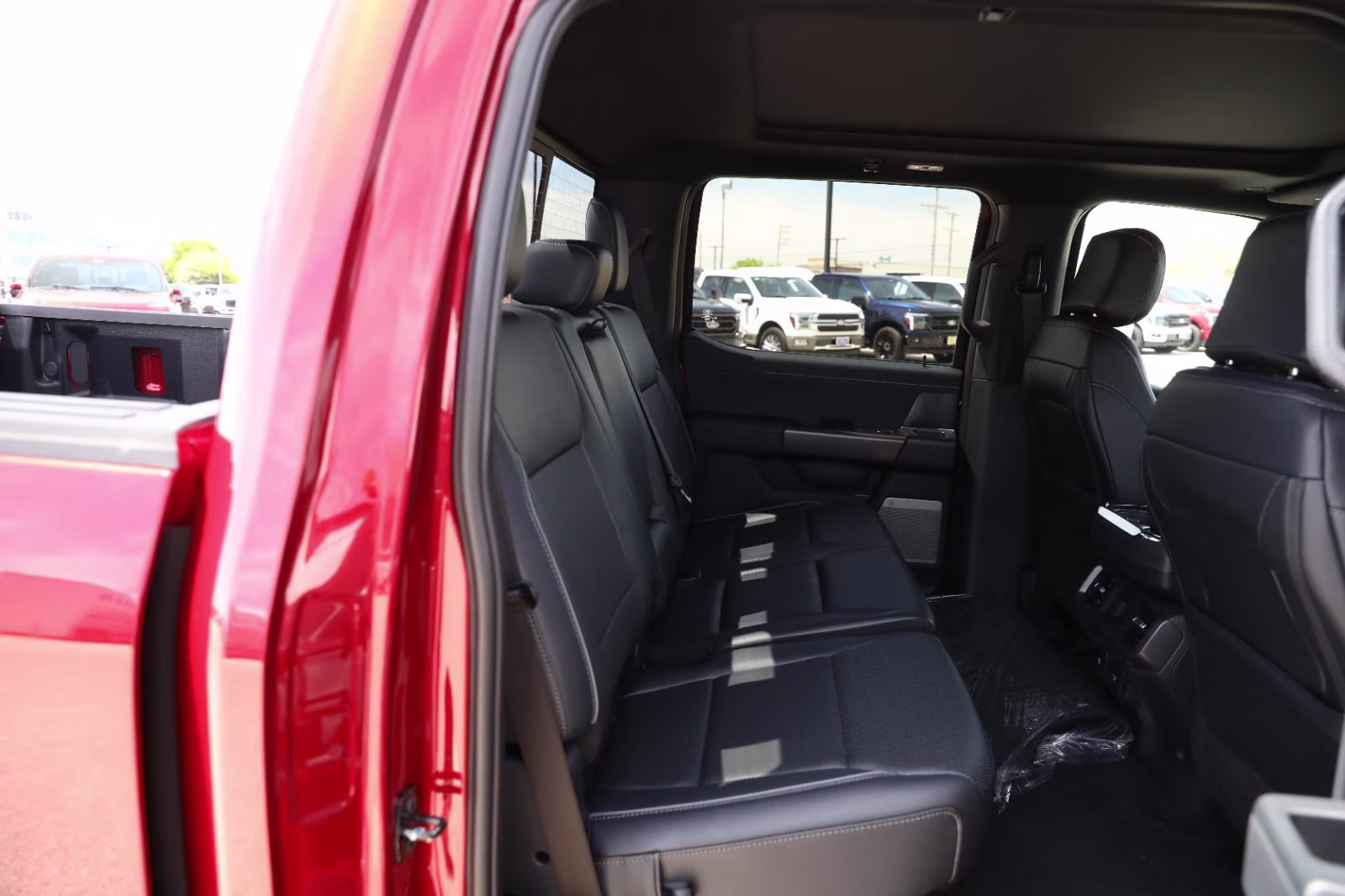 2026 Ruby Red Metallic Tinted Clearcoat Ford F-150 LARIAT 4X4 Truck
