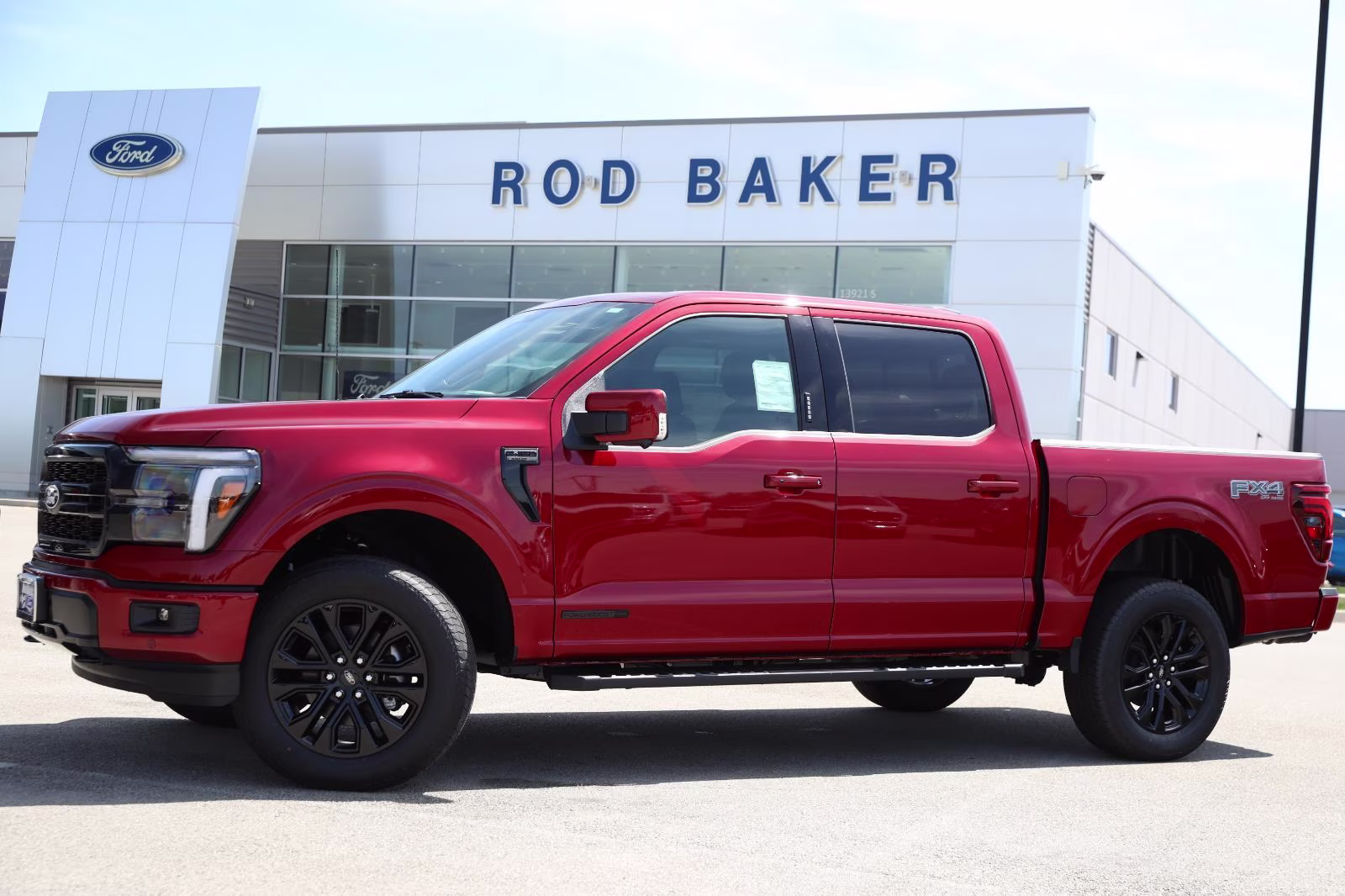 2026 Ruby Red Metallic Tinted Clearcoat Ford F-150 LARIAT 4X4 Truck