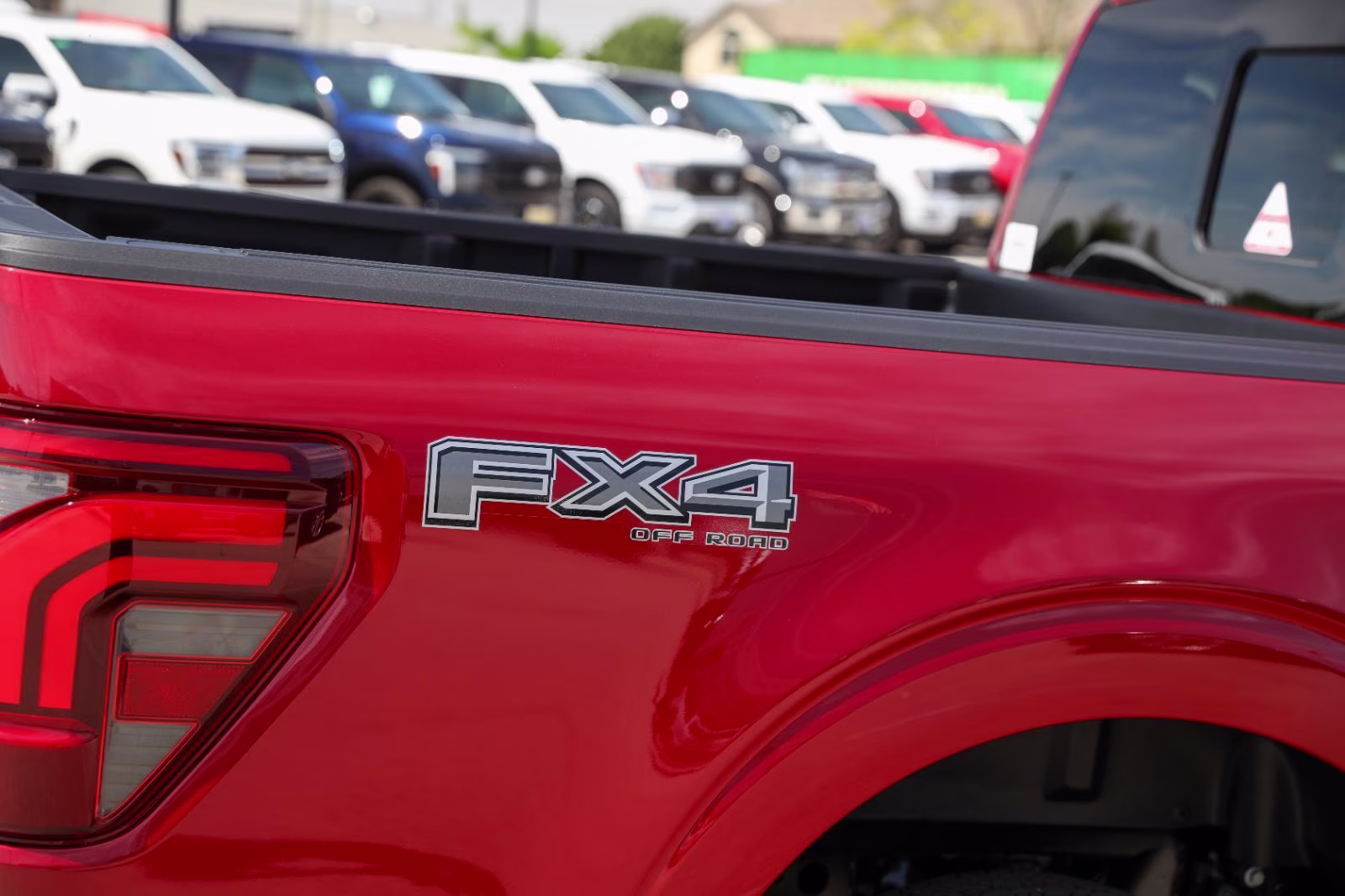 2026 Ruby Red Metallic Tinted Clearcoat Ford F-150 LARIAT 4X4 Truck