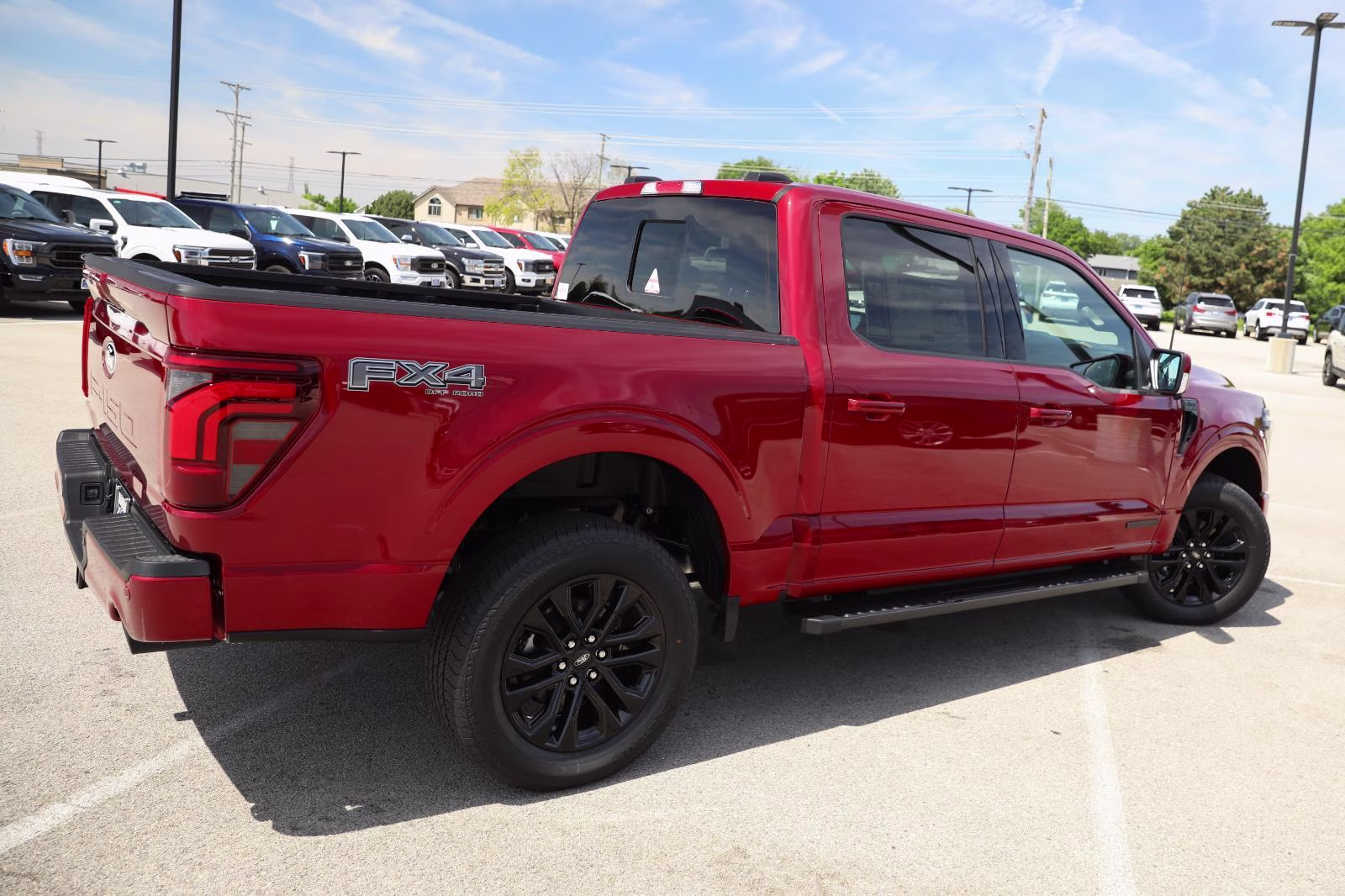 2026 Ruby Red Metallic Tinted Clearcoat Ford F-150 LARIAT 4X4 Truck