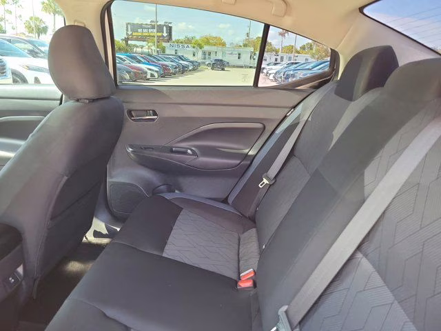 2024 Aspen White Tricoat Nissan Versa 1.6 SV FWD Sedan
