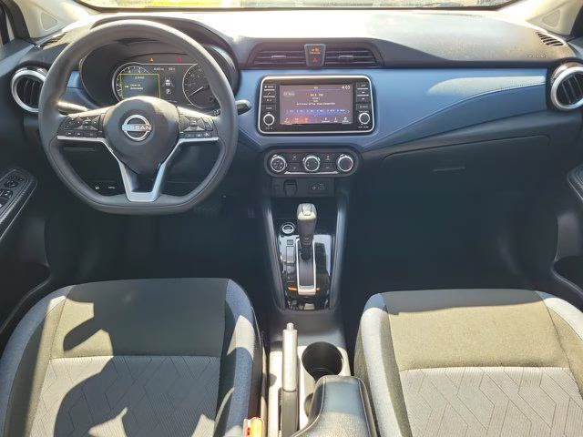 2024 Aspen White Tricoat Nissan Versa 1.6 SV FWD Sedan
