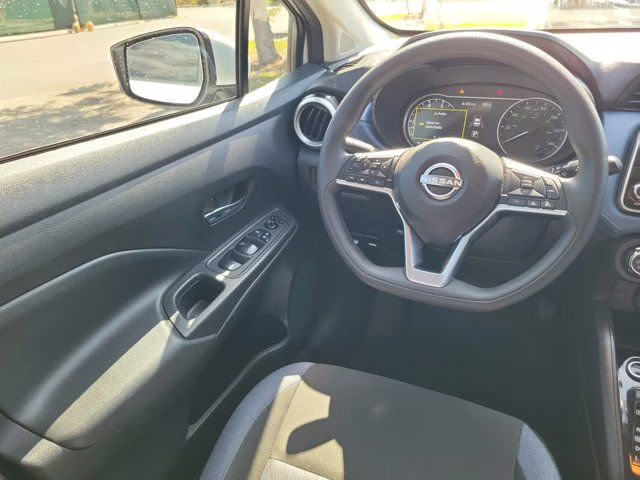 2024 Aspen White Tricoat Nissan Versa 1.6 SV FWD Sedan