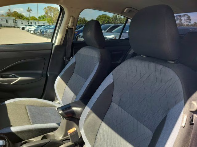 2024 Aspen White Tricoat Nissan Versa 1.6 SV FWD Sedan