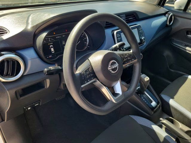 2024 Aspen White Tricoat Nissan Versa 1.6 SV FWD Sedan