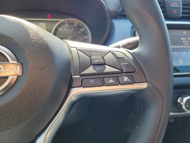 2024 Aspen White Tricoat Nissan Versa 1.6 SV FWD Sedan
