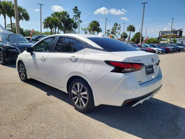 2024 Aspen White Tricoat Nissan Versa 1.6 SV FWD Sedan