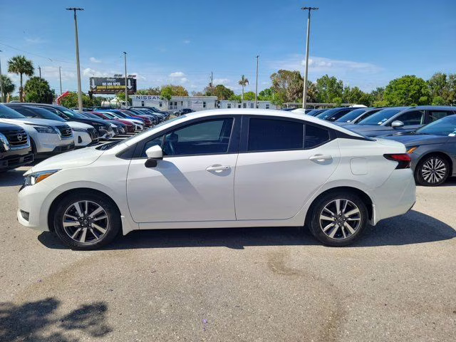 2024 Aspen White Tricoat Nissan Versa 1.6 SV FWD Sedan