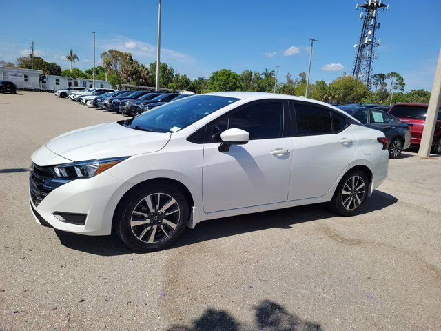 2024 Aspen White Tricoat Nissan Versa 1.6 SV FWD Sedan