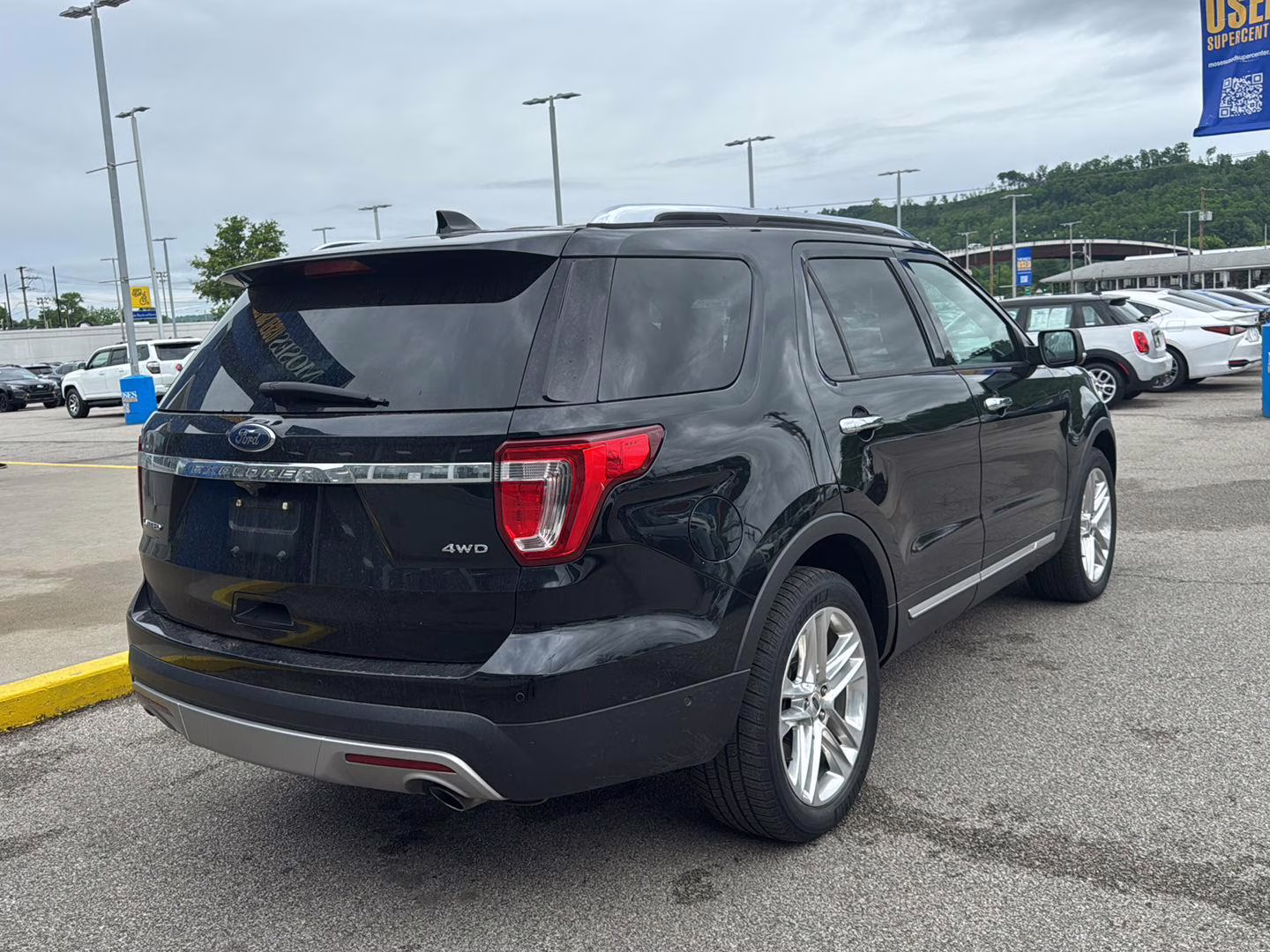 2017 Shadow Black Ford Explorer tan 4X4 SUV
