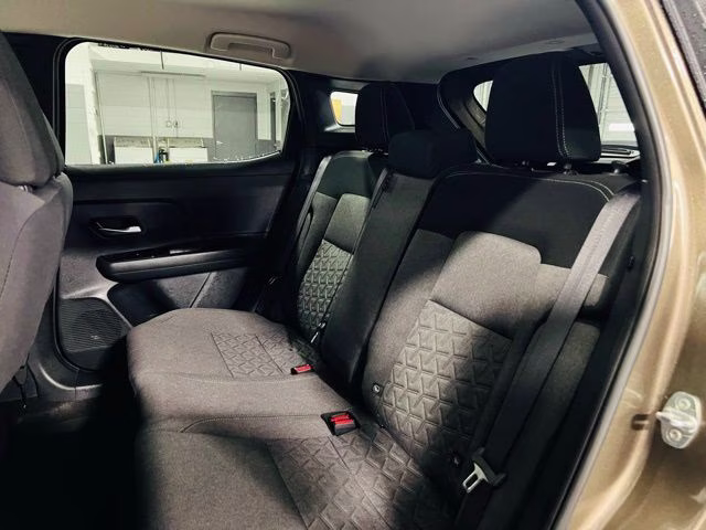 2025 Canyon Bronze Metallic Nissan Kicks SV FWD SUV