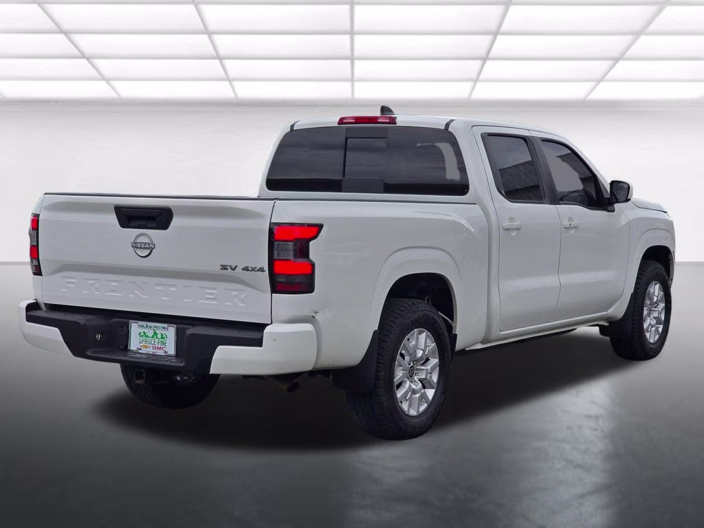 2024 Glacier White Nissan Frontier SV 4X4 Truck