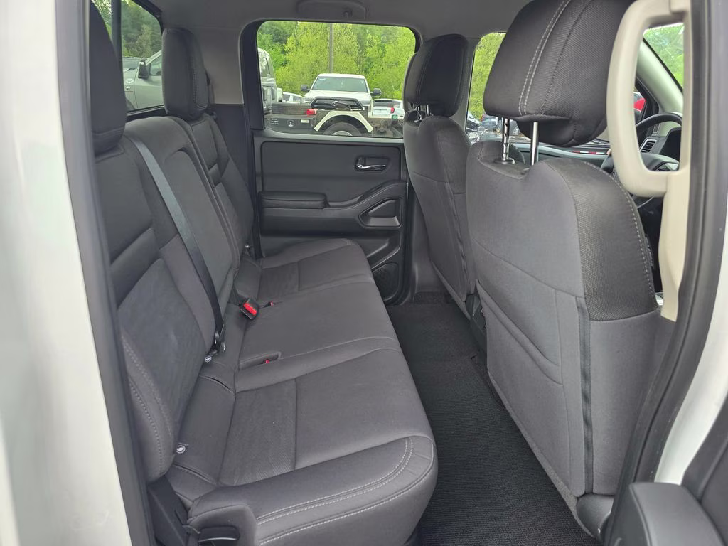 2024 Glacier White Nissan Frontier SV 4X4 Truck