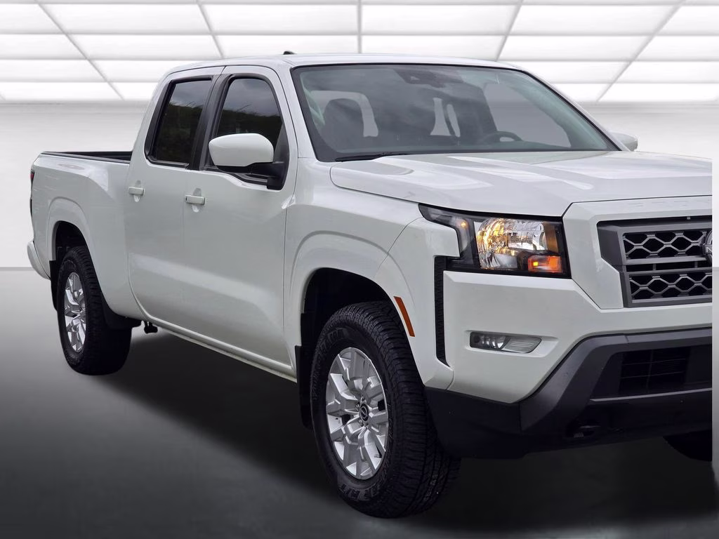 2024 Glacier White Nissan Frontier SV 4X4 Truck