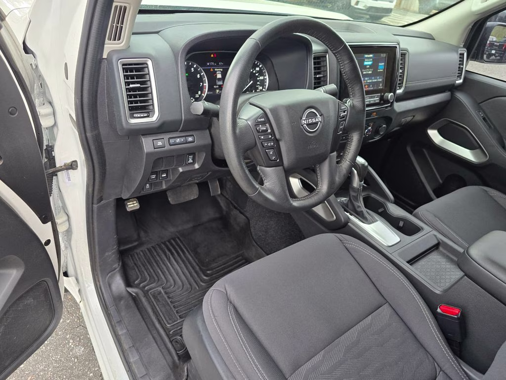 2024 Glacier White Nissan Frontier SV 4X4 Truck
